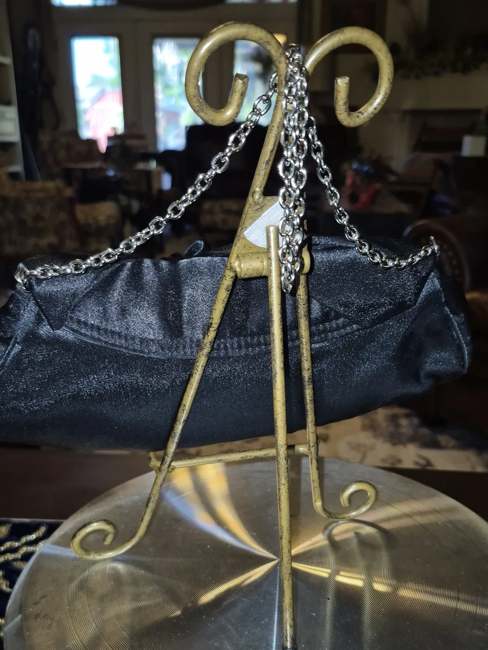 Vintage: A black satin foldover evening bag. Satin Bow& Rusch Pleating &tassels
